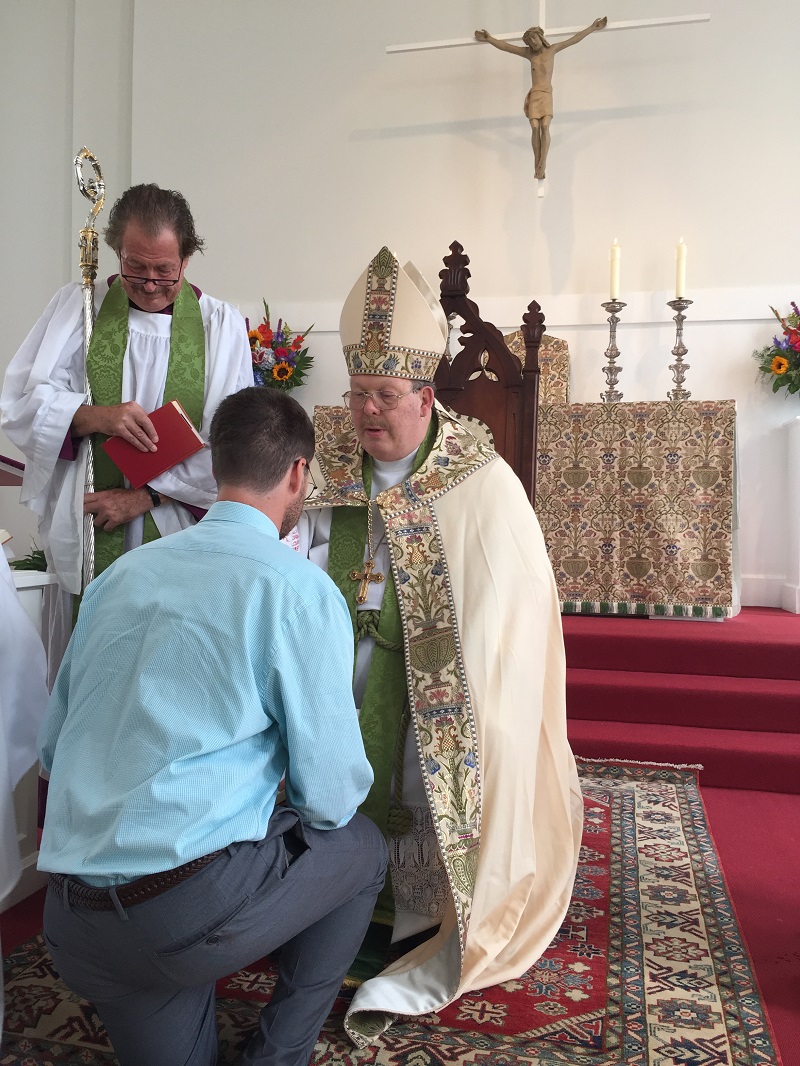 Archbishop John E. Upham, Jr. confirms Mitch Ford in the Faith